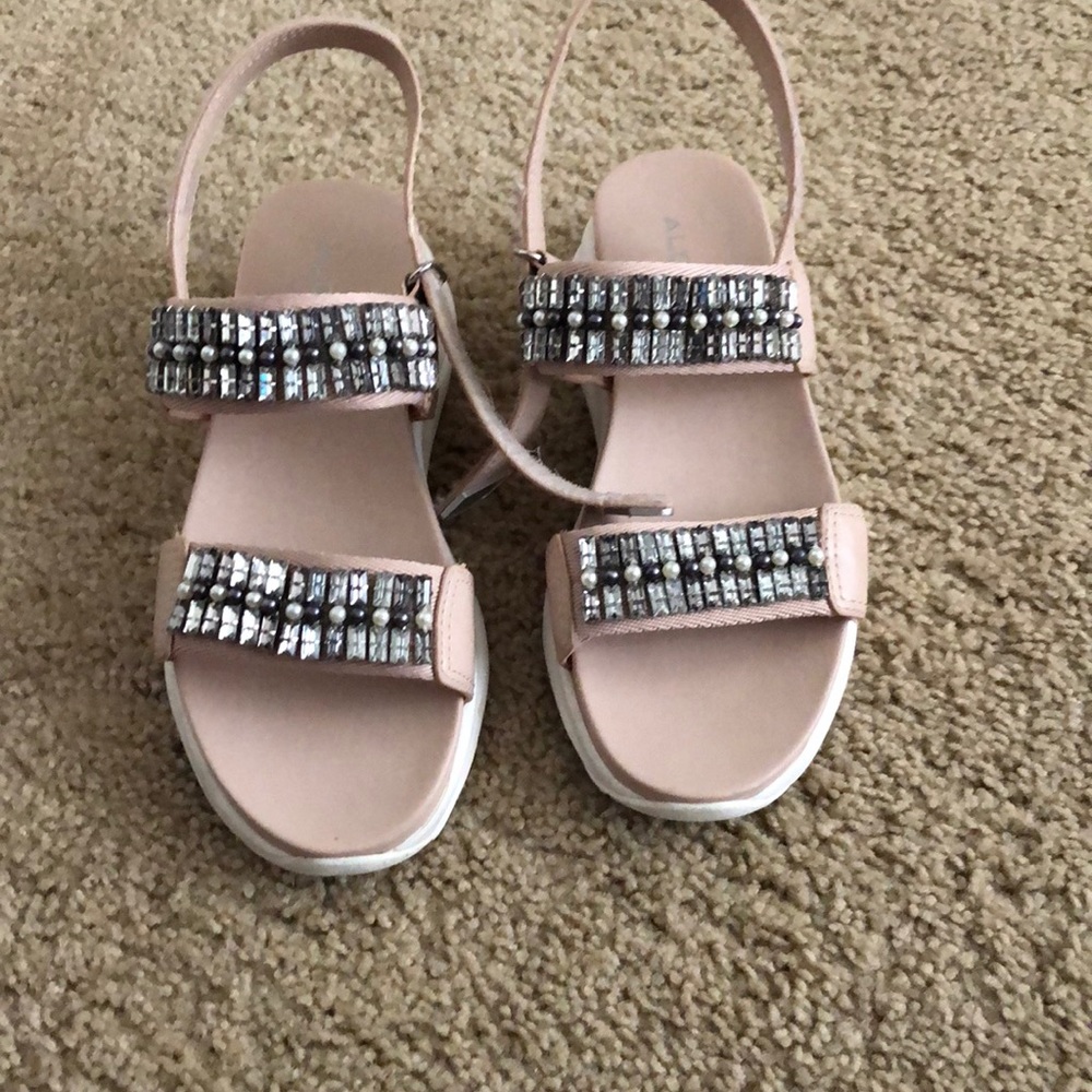 Also chunky Sandler’s with rhinestones